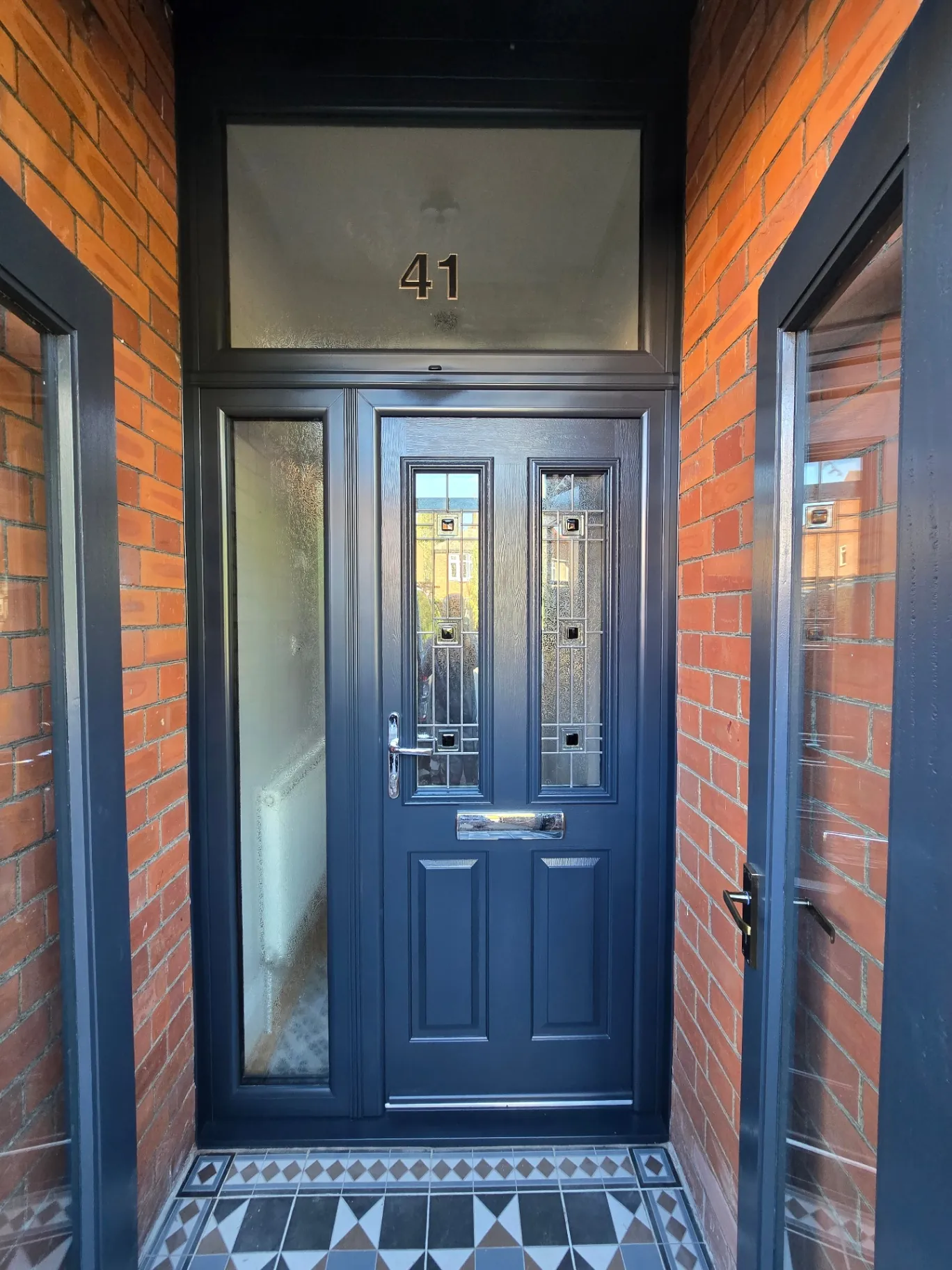 uPVC front door professionally sprayed in a deep navy two-pack finish — Lutterworth, Market Harborough